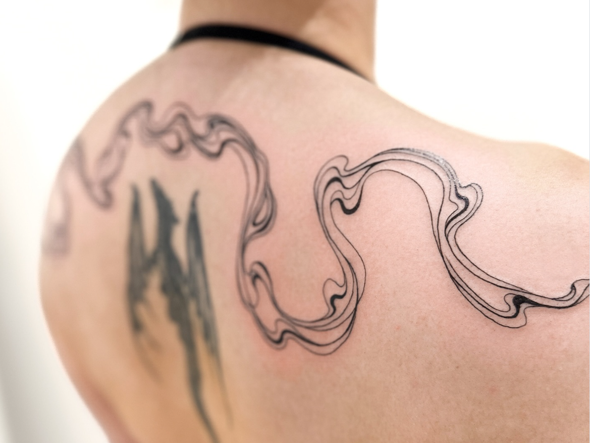 Ultra fine tattoo linework